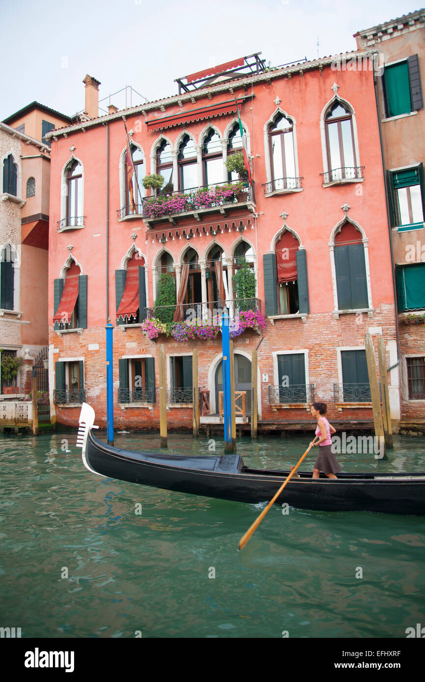 Young woman with gondola, Grand Canal, Venice, Venezia, Italy, Europe Stock Photo