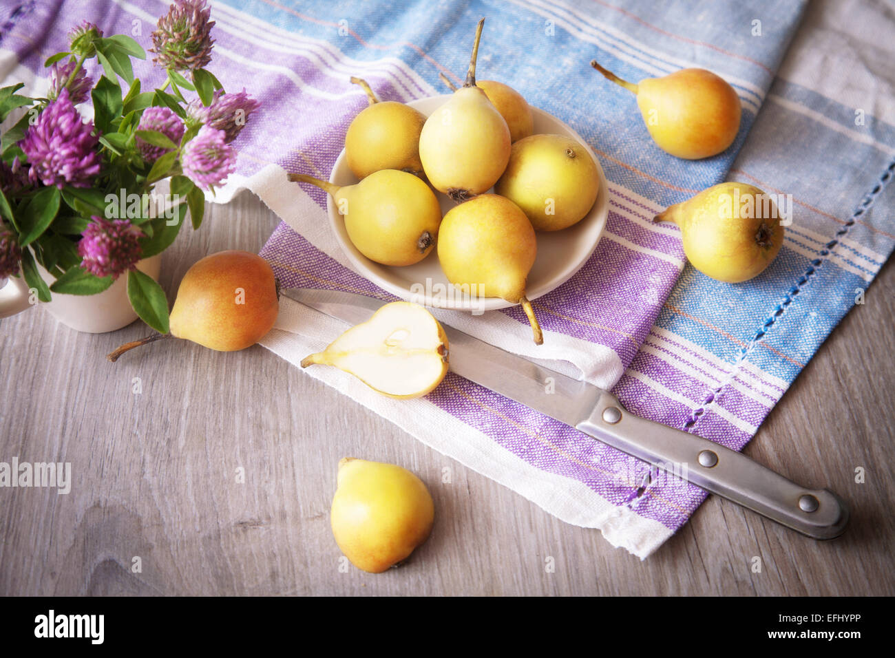 Still life with pears and flowers Stock Photo