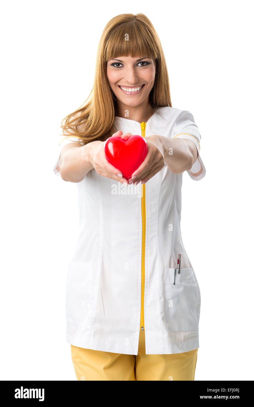 Beautiful nurse ,holding red heart Stock Photo - Alamy