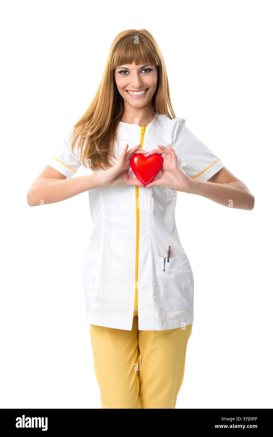 Beautiful nurse ,holding red heart Stock Photo - Alamy