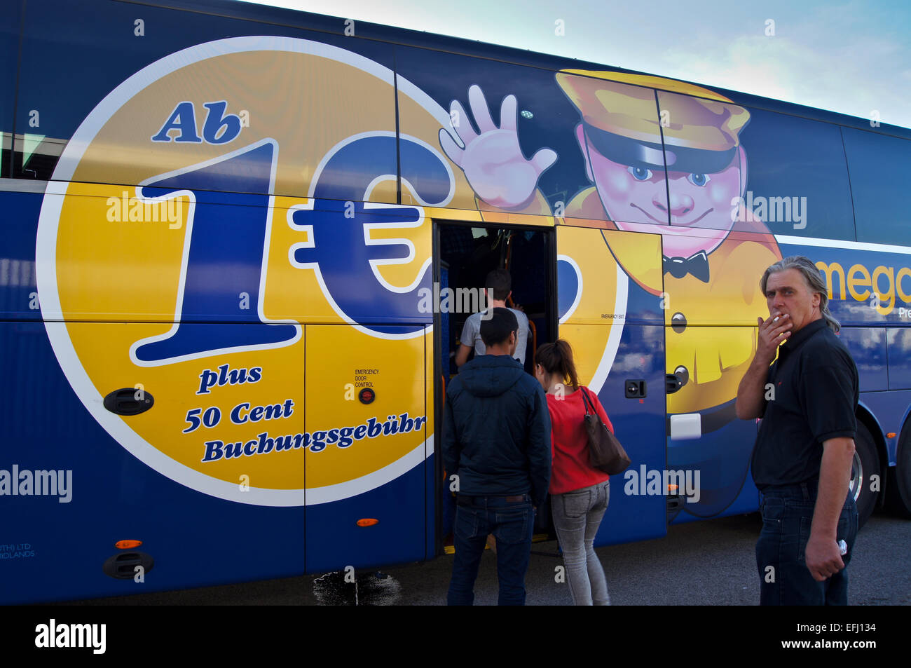 Posters advertising €1 fares on a Megabus coach at Boulogne-sur mer, France Stock Photo