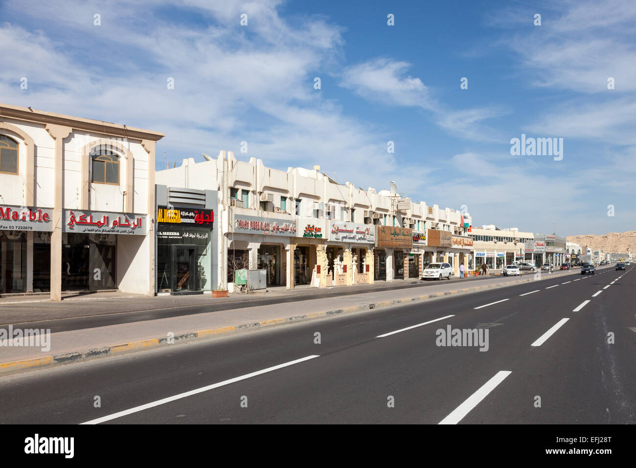 Row of shops in the city of Al Ain, UAE Stock Photo - Alamy