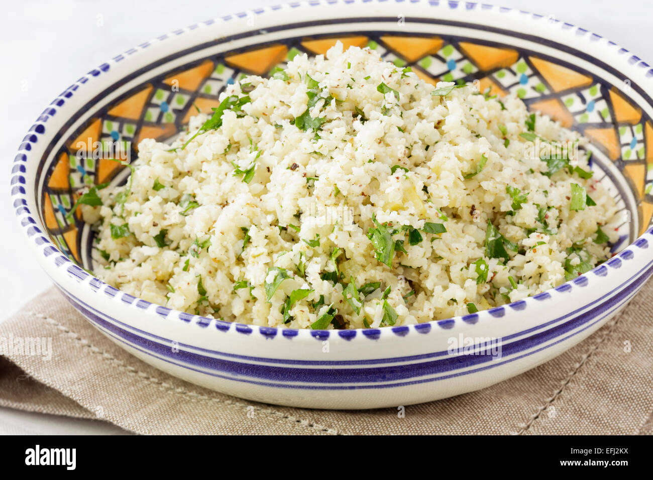 cauliflower prepared as couscous  with chopped parsley, za'atar,  and preserved lemons Stock Photo