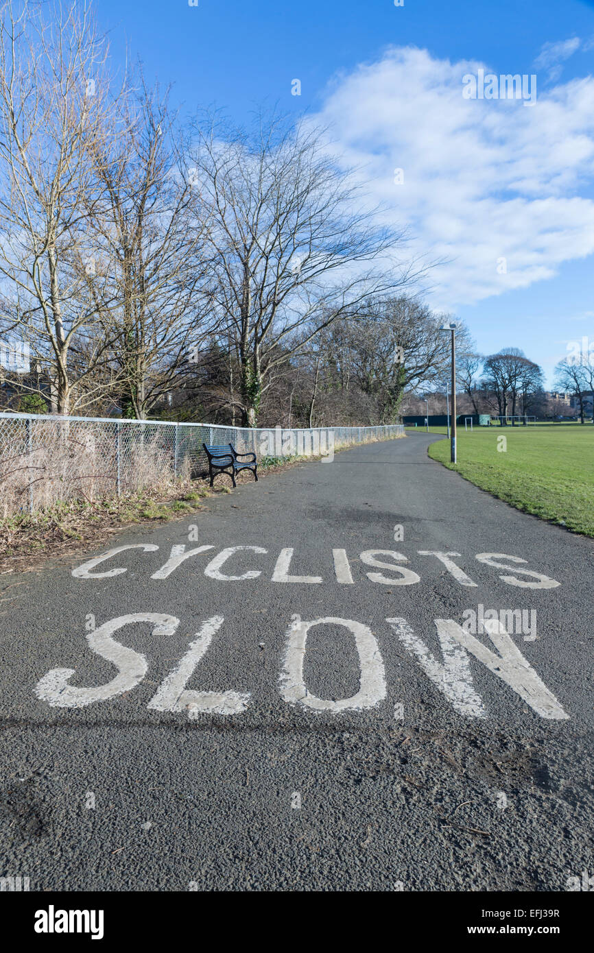 Cyclists slow sign hi-res stock photography and images - Alamy