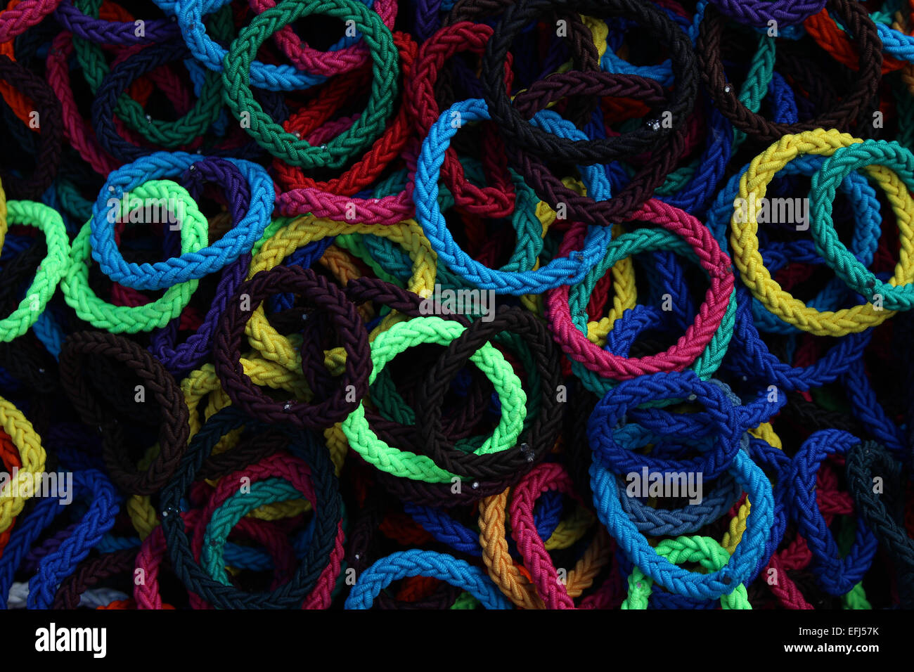 Colorful handmade bracelets for sale at the outdoor craft market in