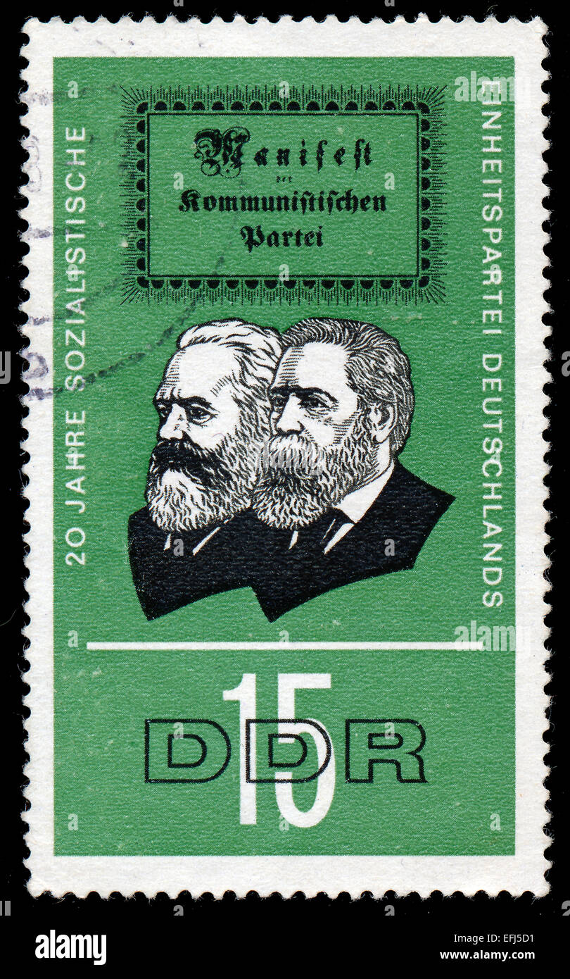 GERMAN DEMOCRATIC REPUBLIC - CIRCA 1966: A stamp printed in Germany shows the 20 years Socialist Unity Party of Germany, circa 1 Stock Photo
