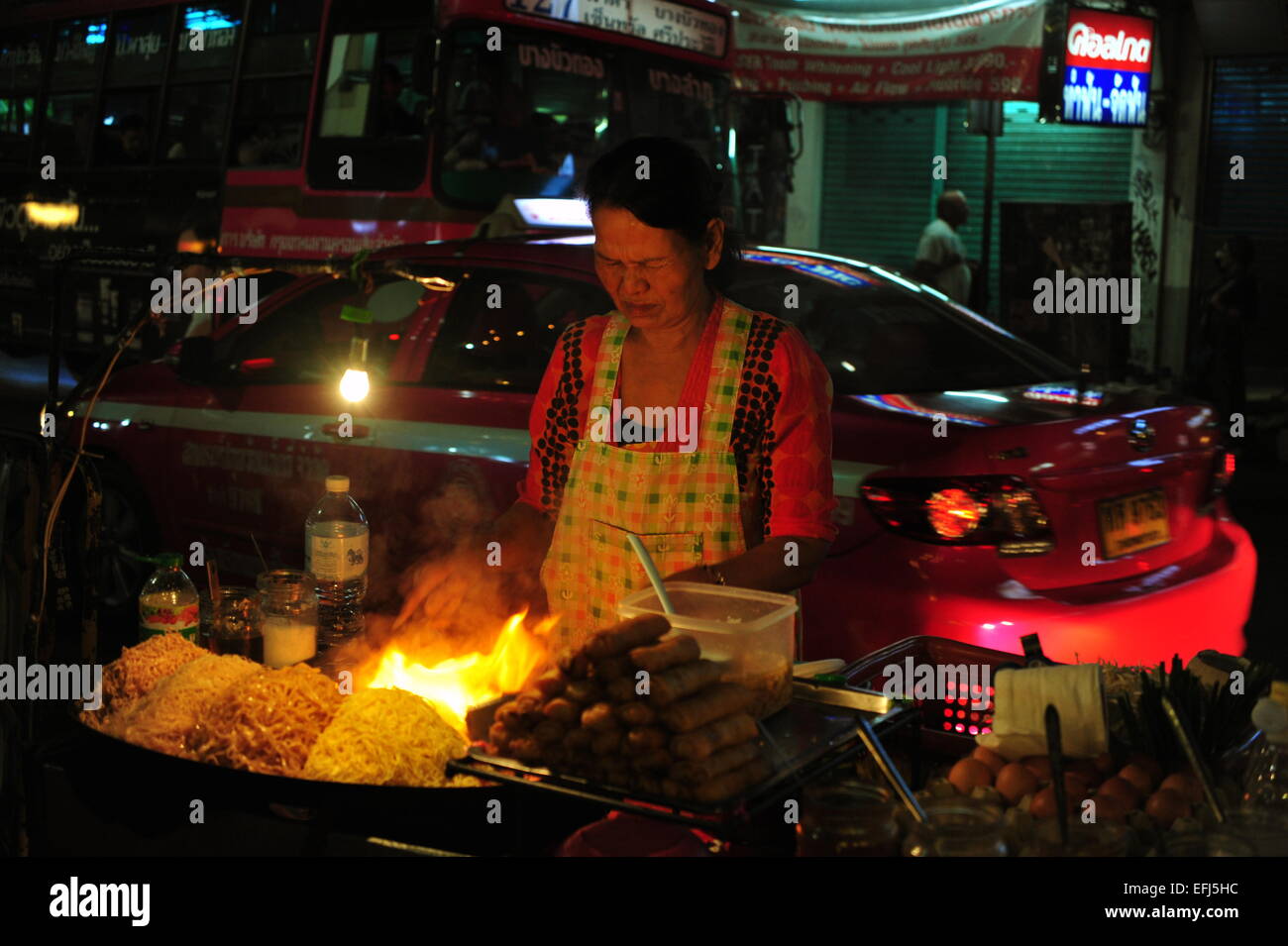 Food Stall, Woman is preparing Pad Thai Noodles, Bangkok, Thailand. Stock Photo