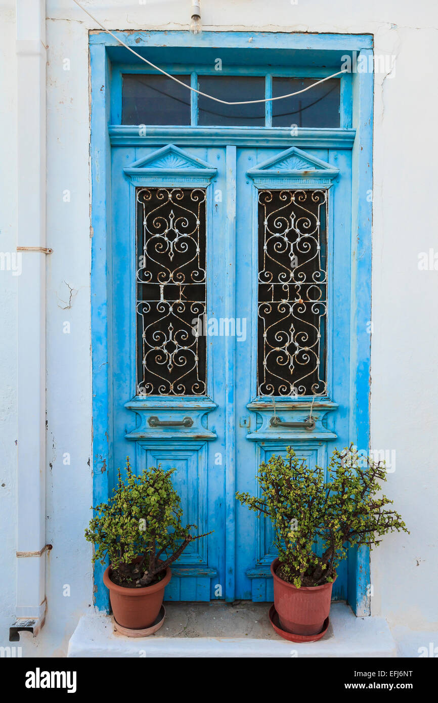 Blue door with potted plants, Karpathos, Dodecanese, South Aegean, Greece Stock Photo