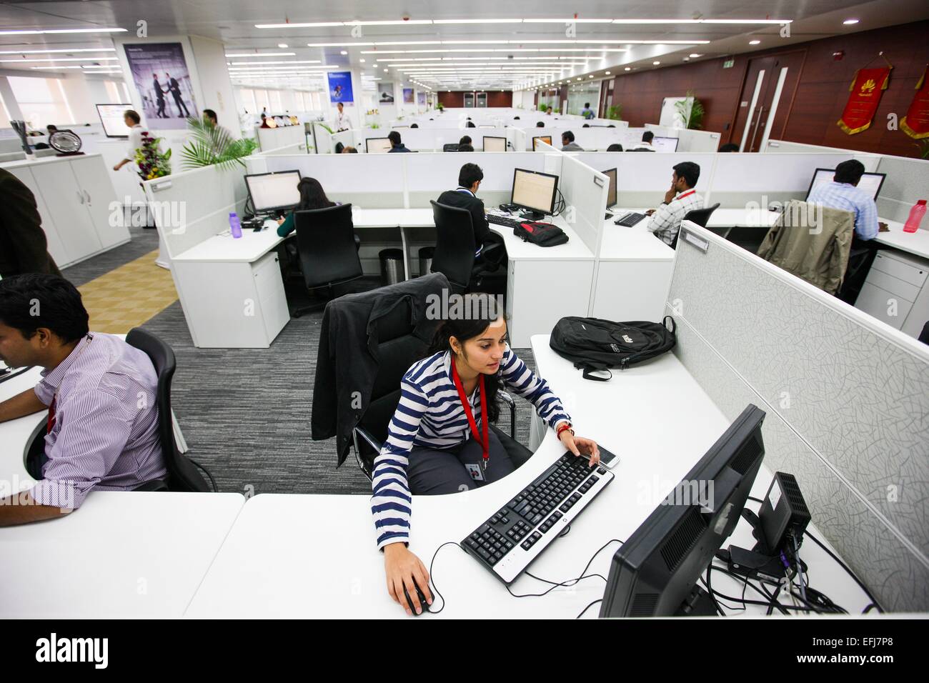 (150205) -- BENGALURU, Feb. 5, 2015 (Xinhua) -- Employees work at Huawei's new research and development center in Bengaluru, India, Feb. 5, 2015. Chinese multinational networking and telecommunications equipment and services company Huawei on Thursday launched its new research and development center in Bengaluru. With an investment of 170 million U.S. dollars and an area of 20 acres, it is the largest research and development center of Huawei outside of China. The new center is also an exhibit of cooperation between China and India in the field of information and communications technology (ICT Stock Photo