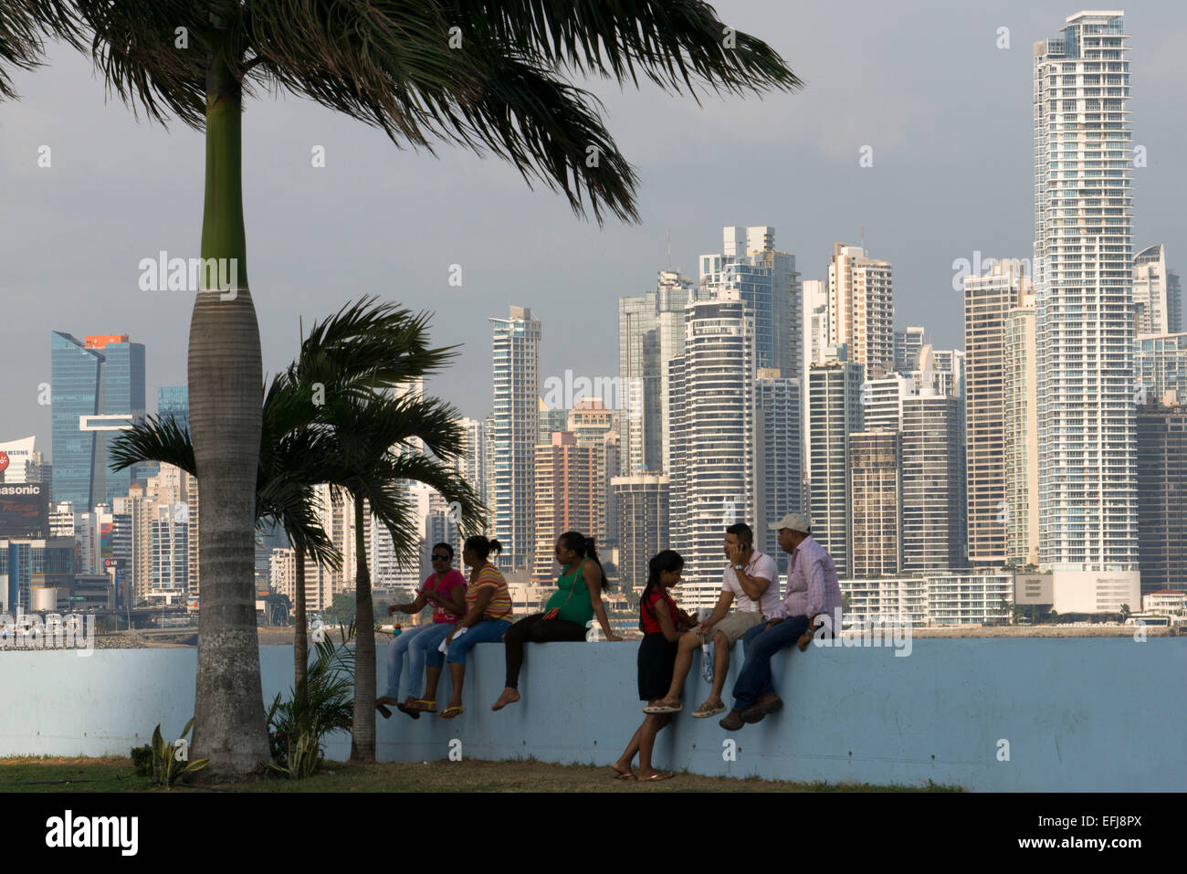 People at Cinta Costera in Panama City. Skyline, Panama City, Panama, Central America. Cinta Costera Pacific Ocean Coastal Beltw Stock Photo