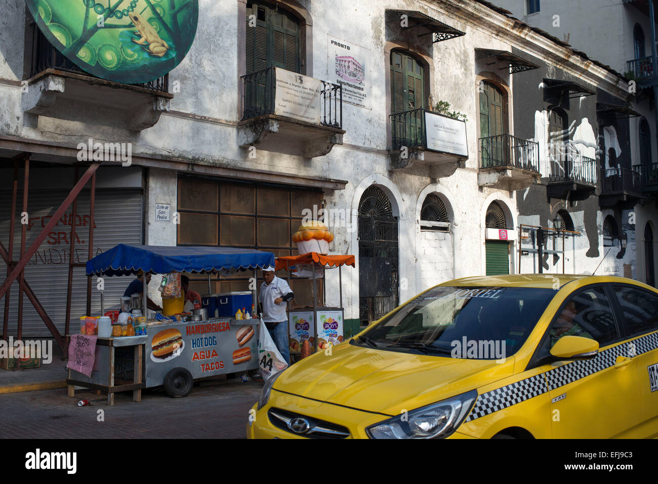 Yellow taxi cub in Casco Antiguo Historic Town Panama City Central America old town houses. The food in Panama tends to be good Stock Photo