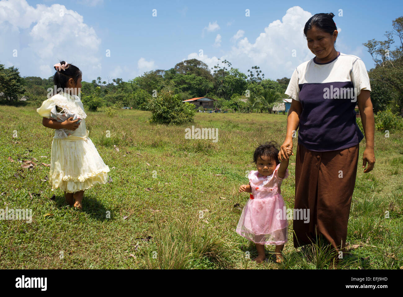 Family and Houses In The Ngobe Bugle Indian Village Of Salt Creek Near