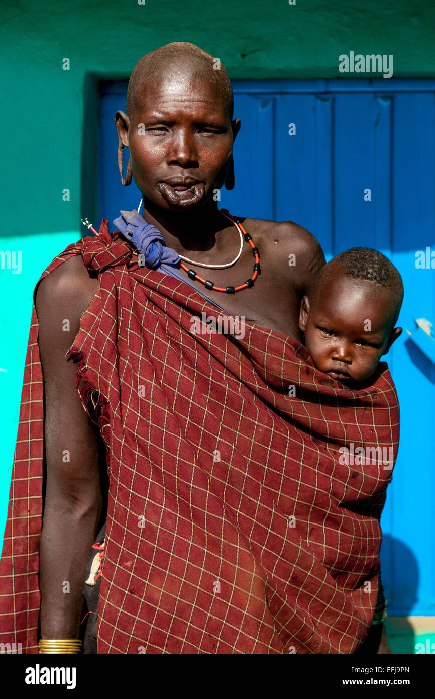 Portrait Of A Woman and Baby From The Mursi Tribe, Jinka Town, Omo Valley, Ethiopia Stock Photo