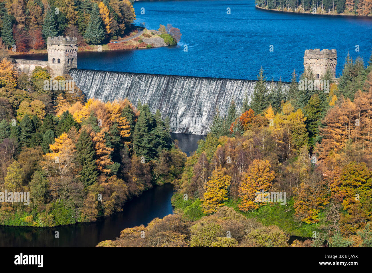 Howden dam in the Derwent valley with rich autumn colours in the landscape. A beautiful place in the Peak District, Derbyshire, England. Stock Photo