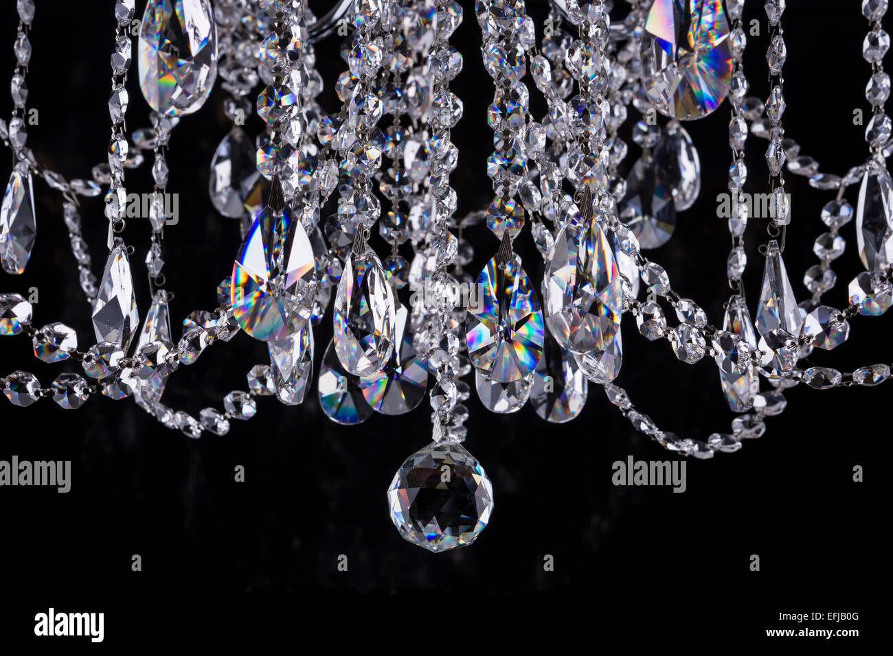 Close-up of crystal chandelier details on black background Stock Photo