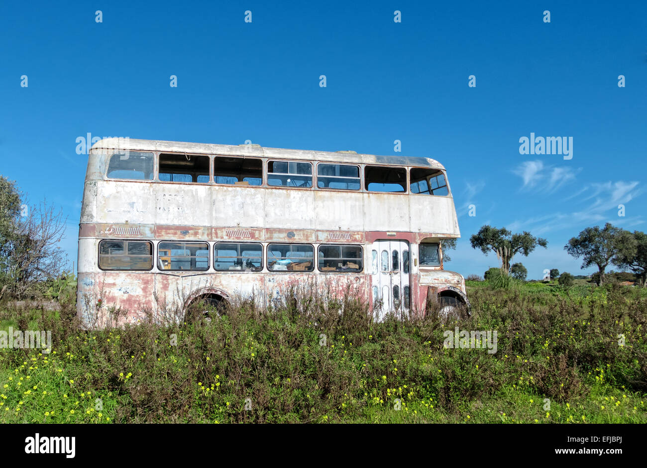 Rusty abandoned double decker bus hi-res stock photography
