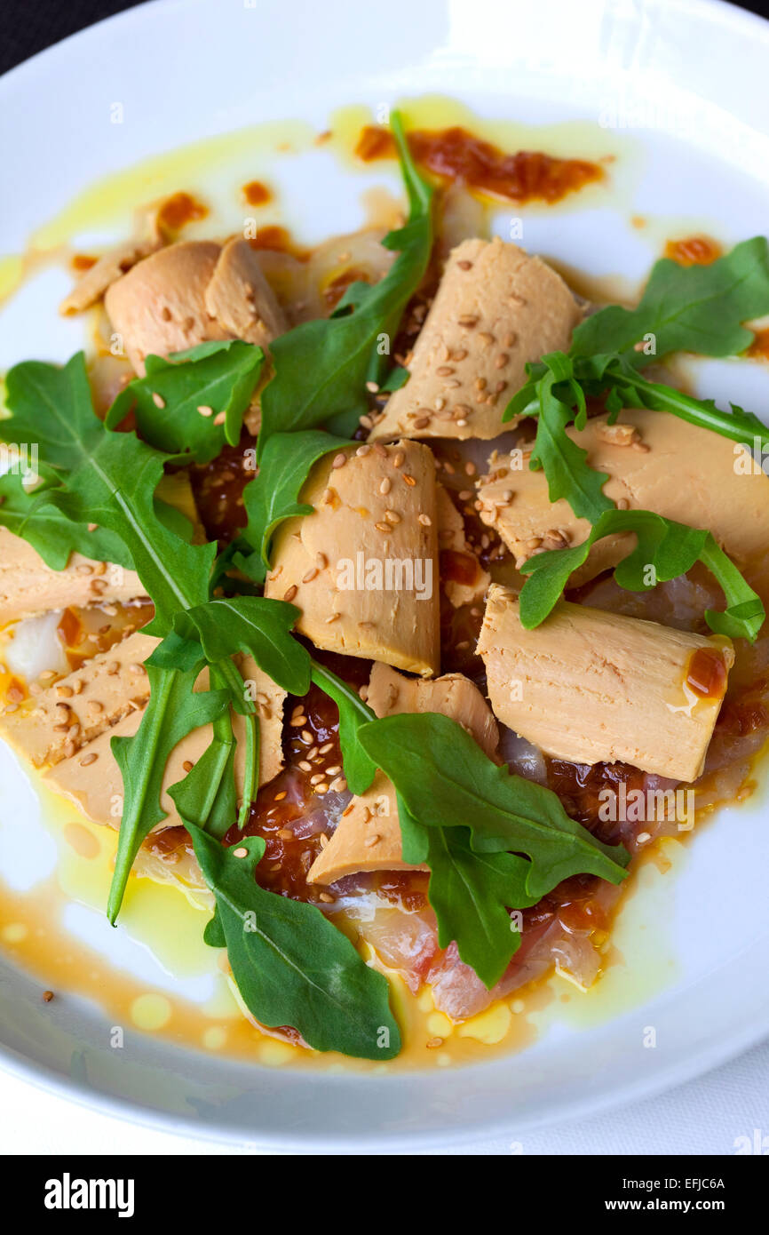 Mixed salad with cod carpaccio and foie gras Stock Photo
