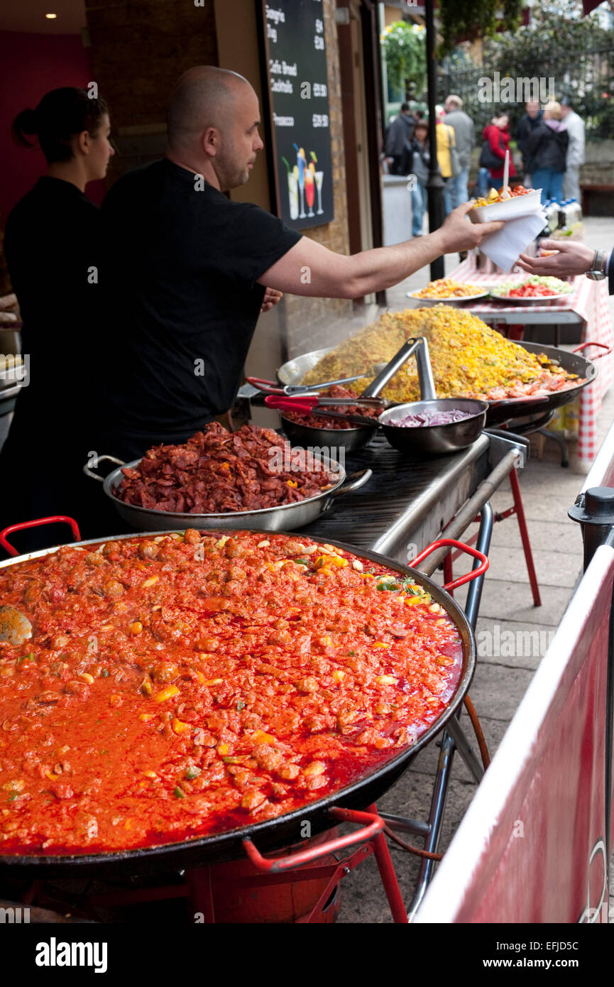Paella being prepared at Borough Market. Borough Market is a wholesale and retail food market in Southwark, London, England. It Stock Photo