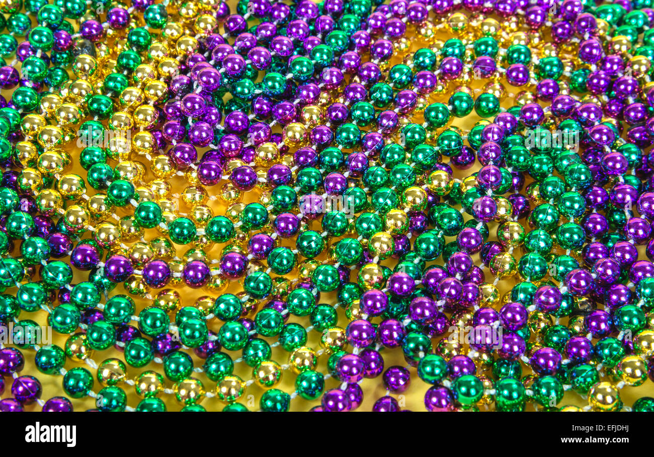 Colorful Mardi Gras beads background Stock Photo
