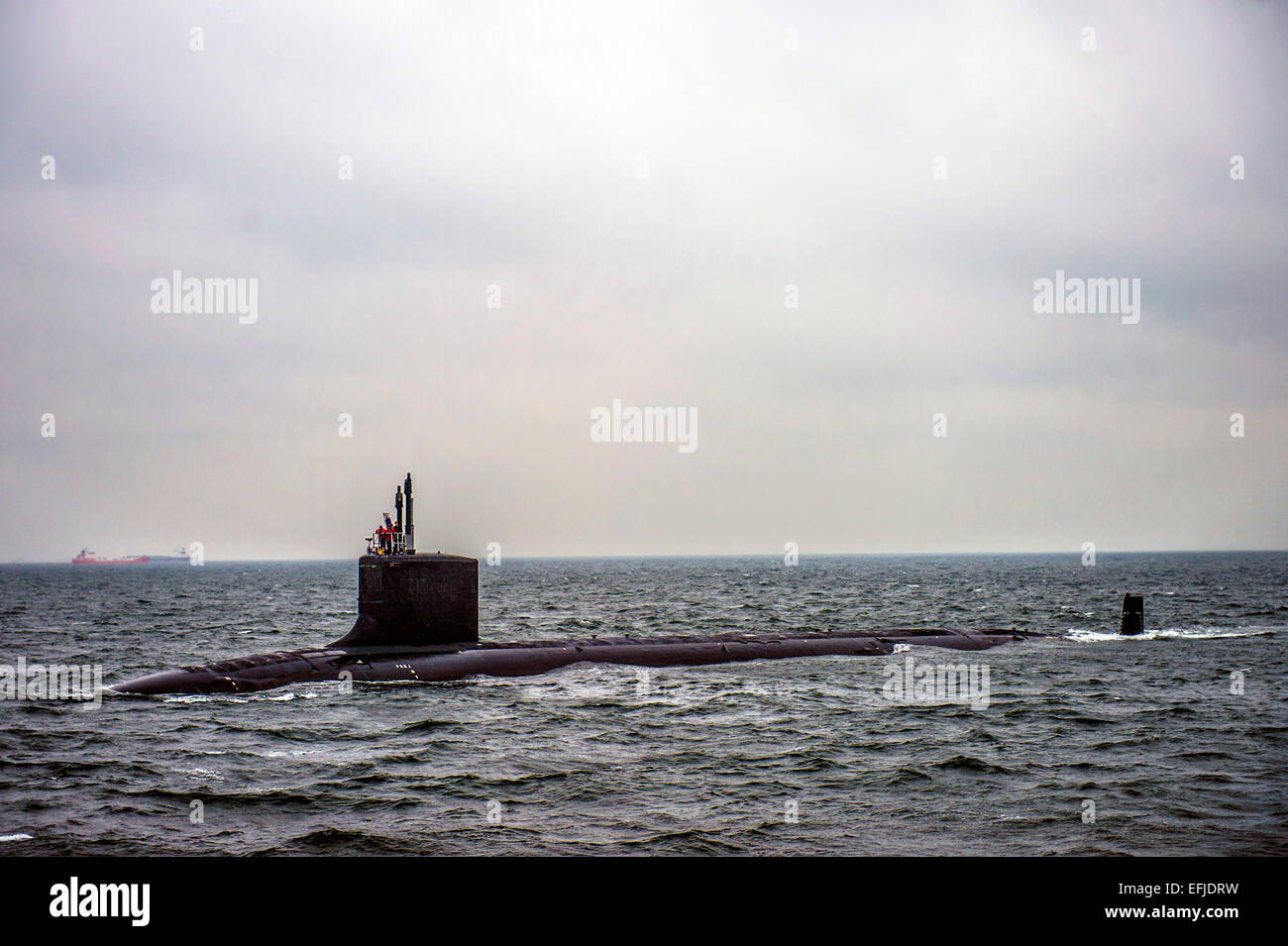 US Navy Virginia-class fast-attack submarine USS Hawaii returns to Fleet Activities Yokosuka for a port visit February 5, 2015 in Yokosuka, Japan Stock Photo
