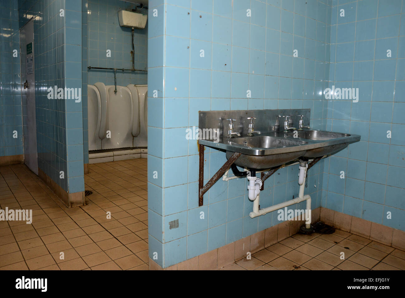 The inside of an old fashioned mens public toilet, Beach Green, Shoreham, East Sussex. Stock Photo