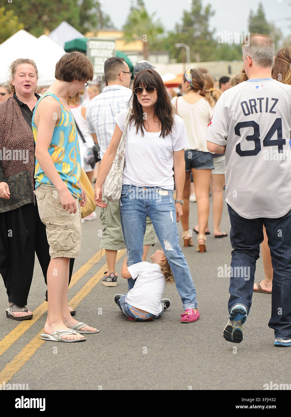 Selma Blair does an outfit change at the farmers market with her son