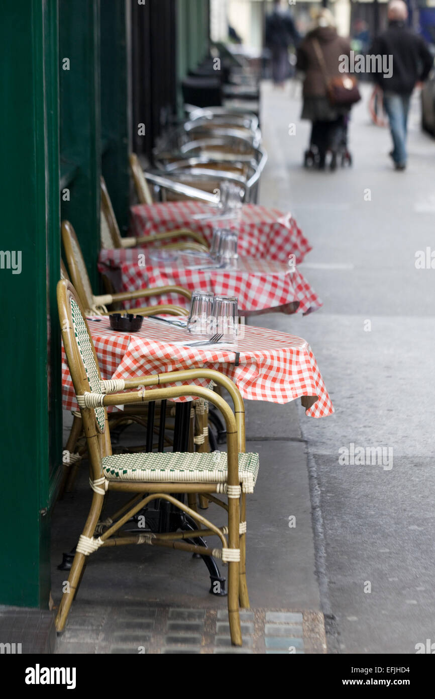 Empty dinning Tables at a outside restaurant Stock Photo