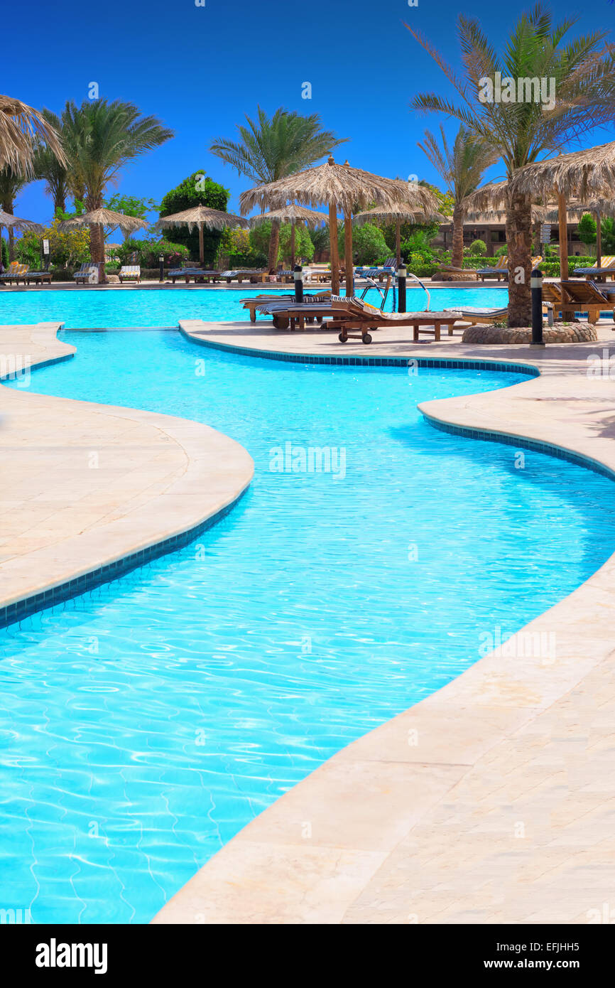 swimming pool at Hilton Long Beach Resort Hotel in Hurghada, Egypt Stock Photo