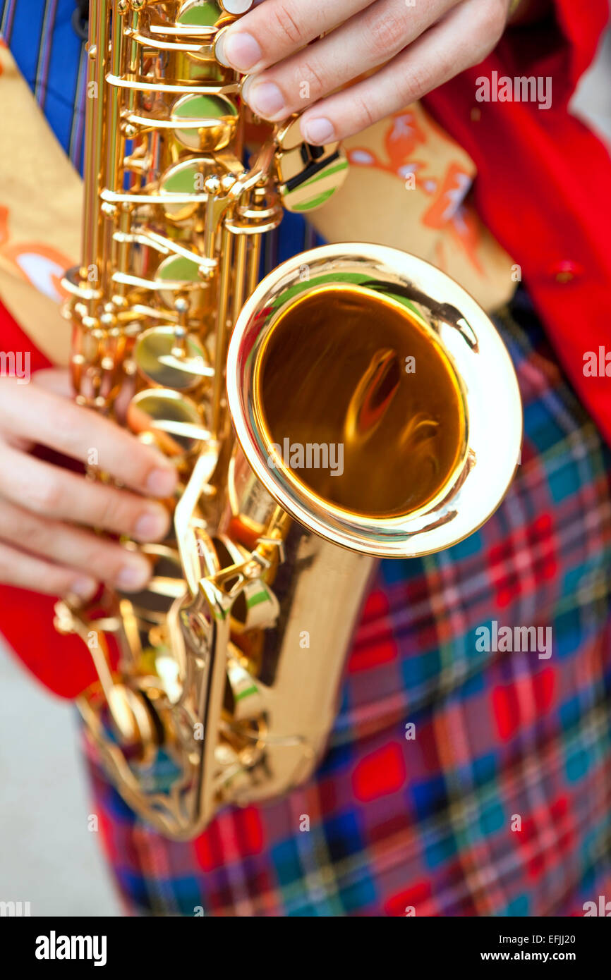 Playing saxophone in a marching band Stock Photo Alamy