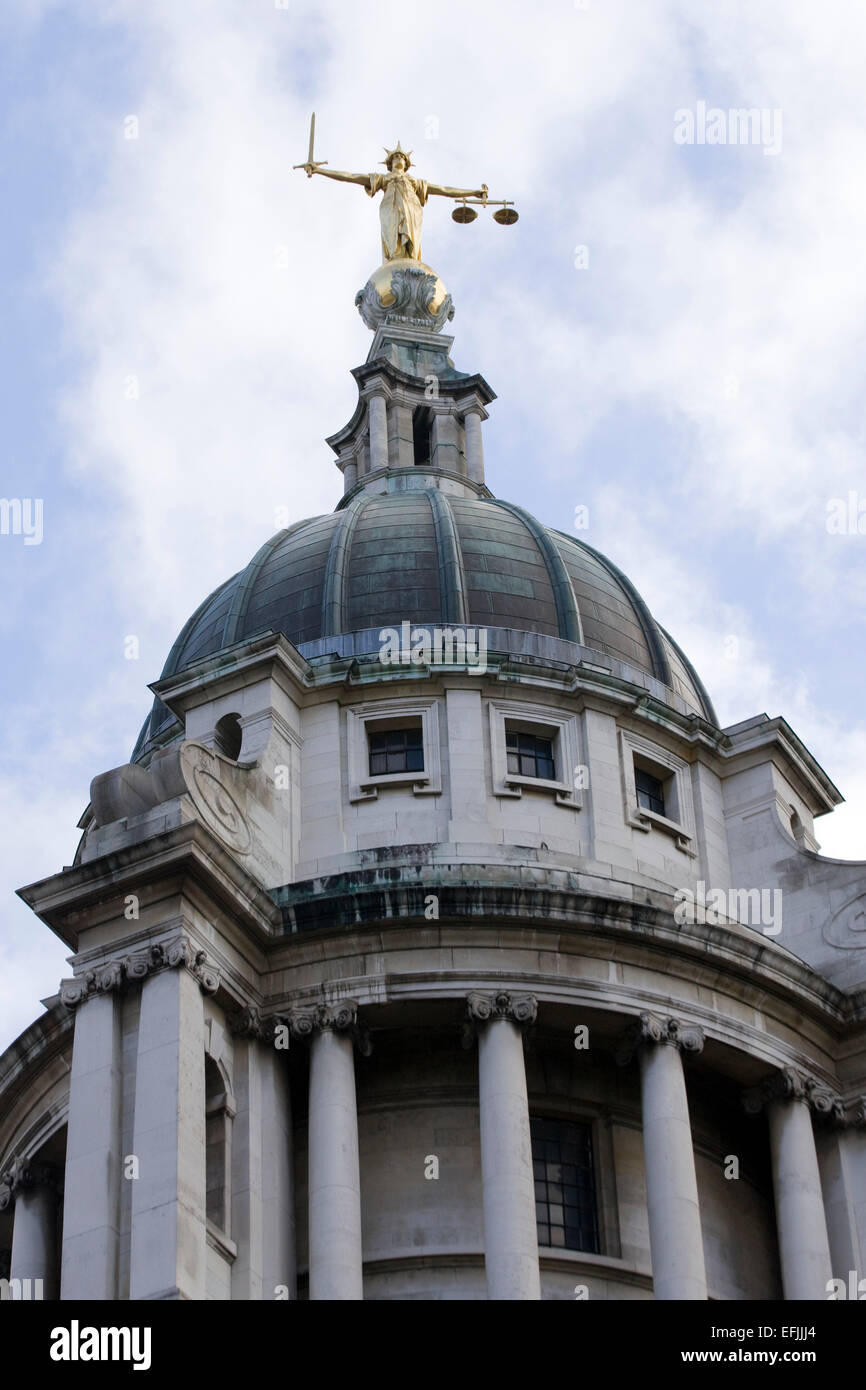 Gold statue of Lady Justice statue on the top of the Old Bailey London