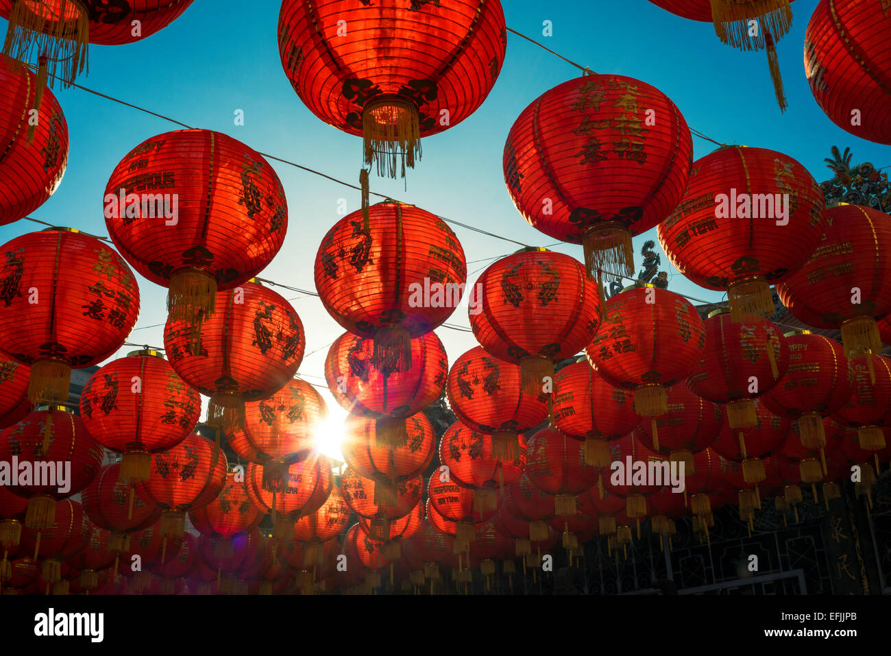 Chinese Lanterns over clear blue sky and temple Stock Photo - Alamy