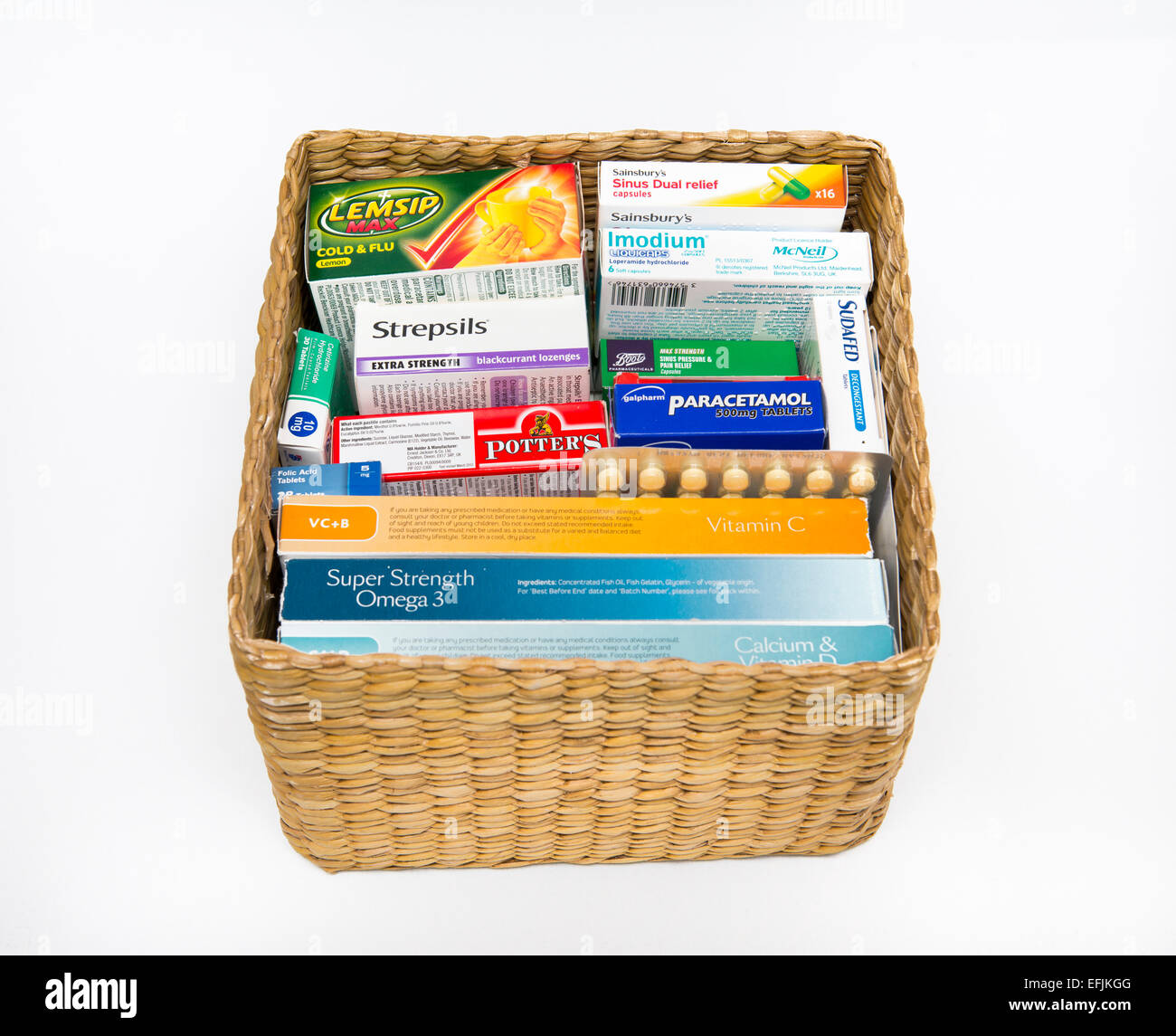A basket of vitamins, remedies and medicine. Stock Photo