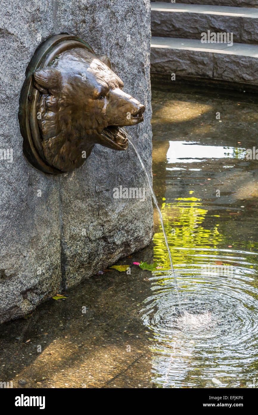 Bronze bear and granite detail of Tilikum Place sculpture in Seattle, a sculpture created by