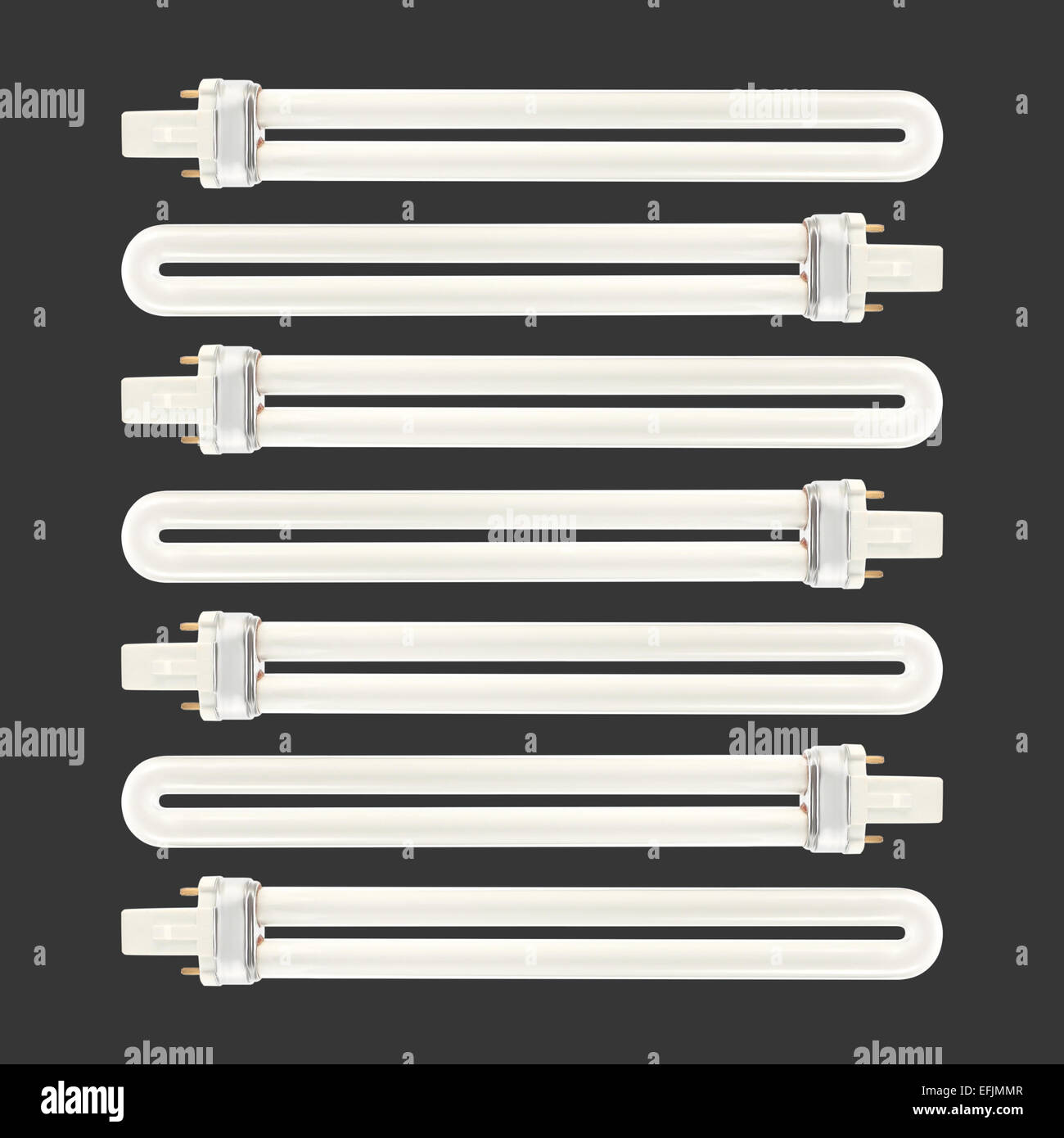 Compact Fluorescent 2 Pin Light Bulbs on a black background Stock Photo