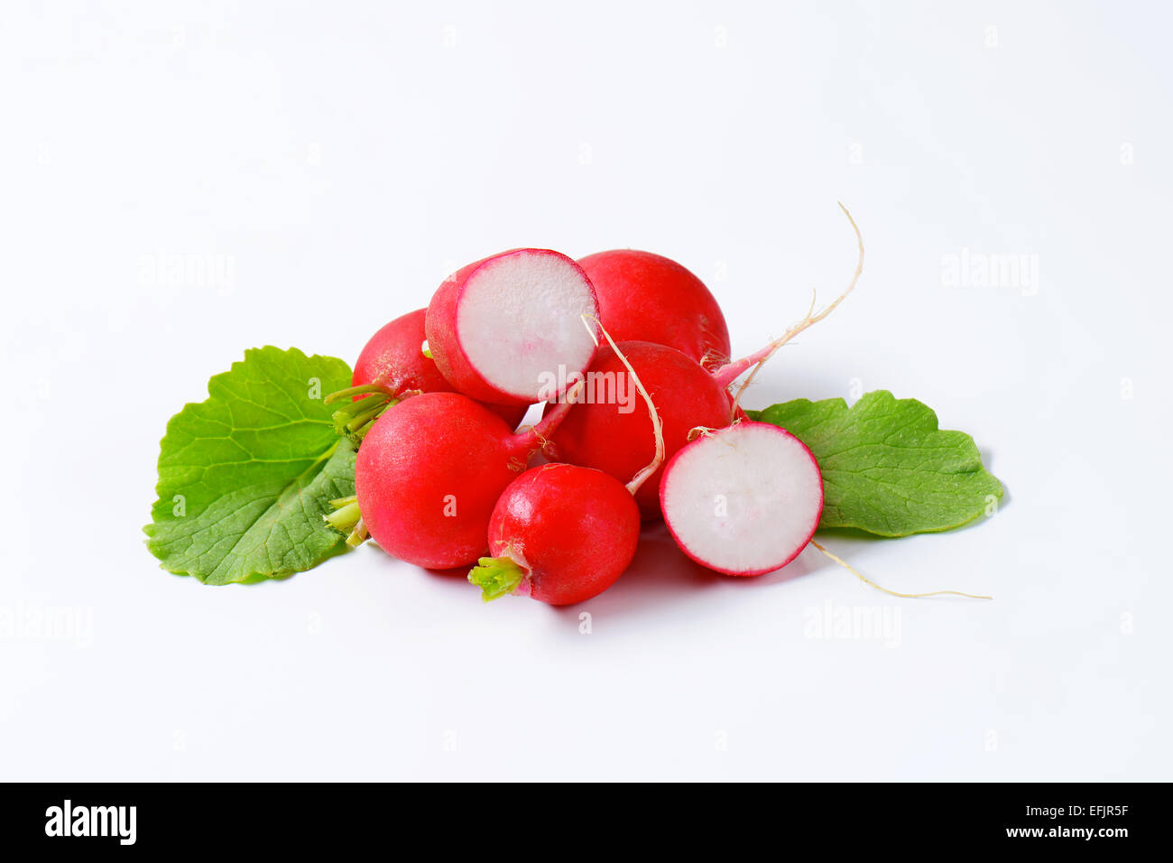 Fresh red radishes on white background Stock Photo Alamy