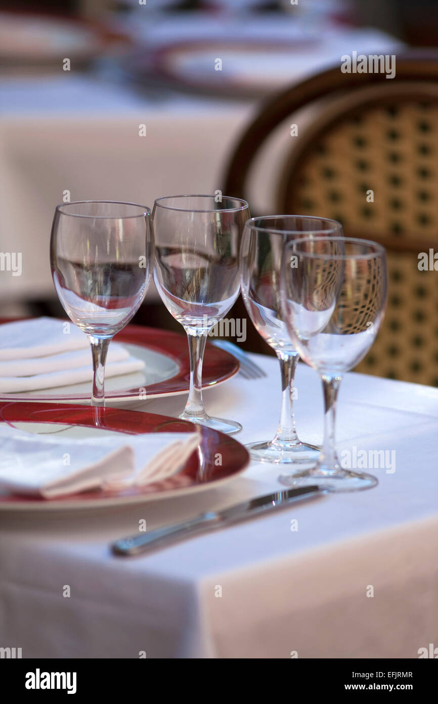 Table set up in a restaurant Stock Photo - Alamy