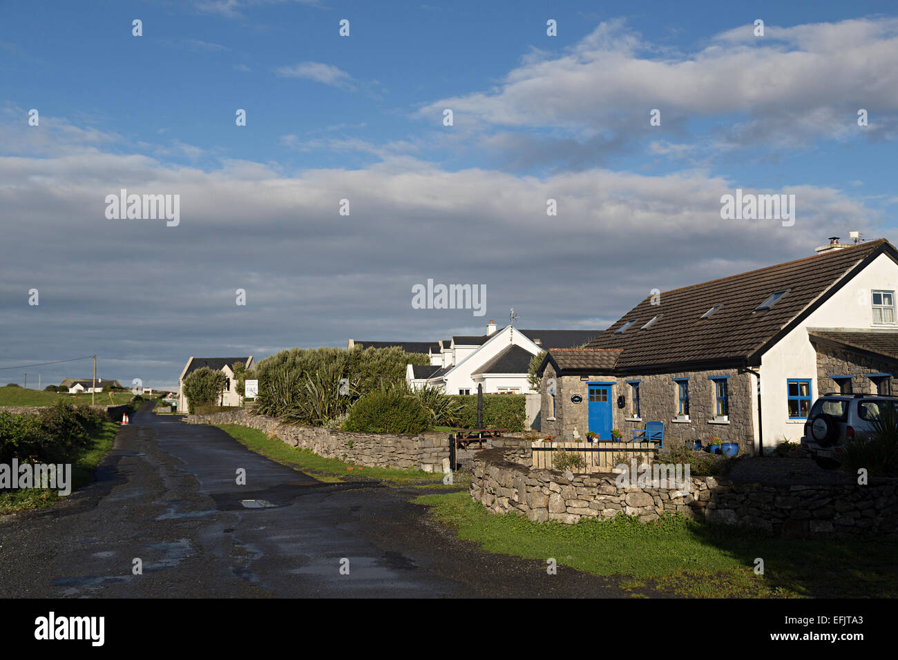 Residential rural street of houses at Fitz's Cross near Doolin, Co. Clare, Ireland Stock Photo