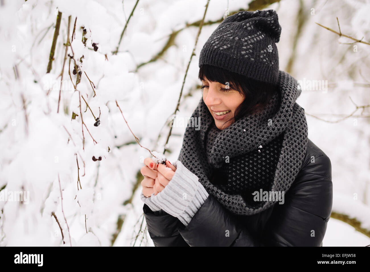 Portrait of a beautiful girl in winter forest Stock Photo