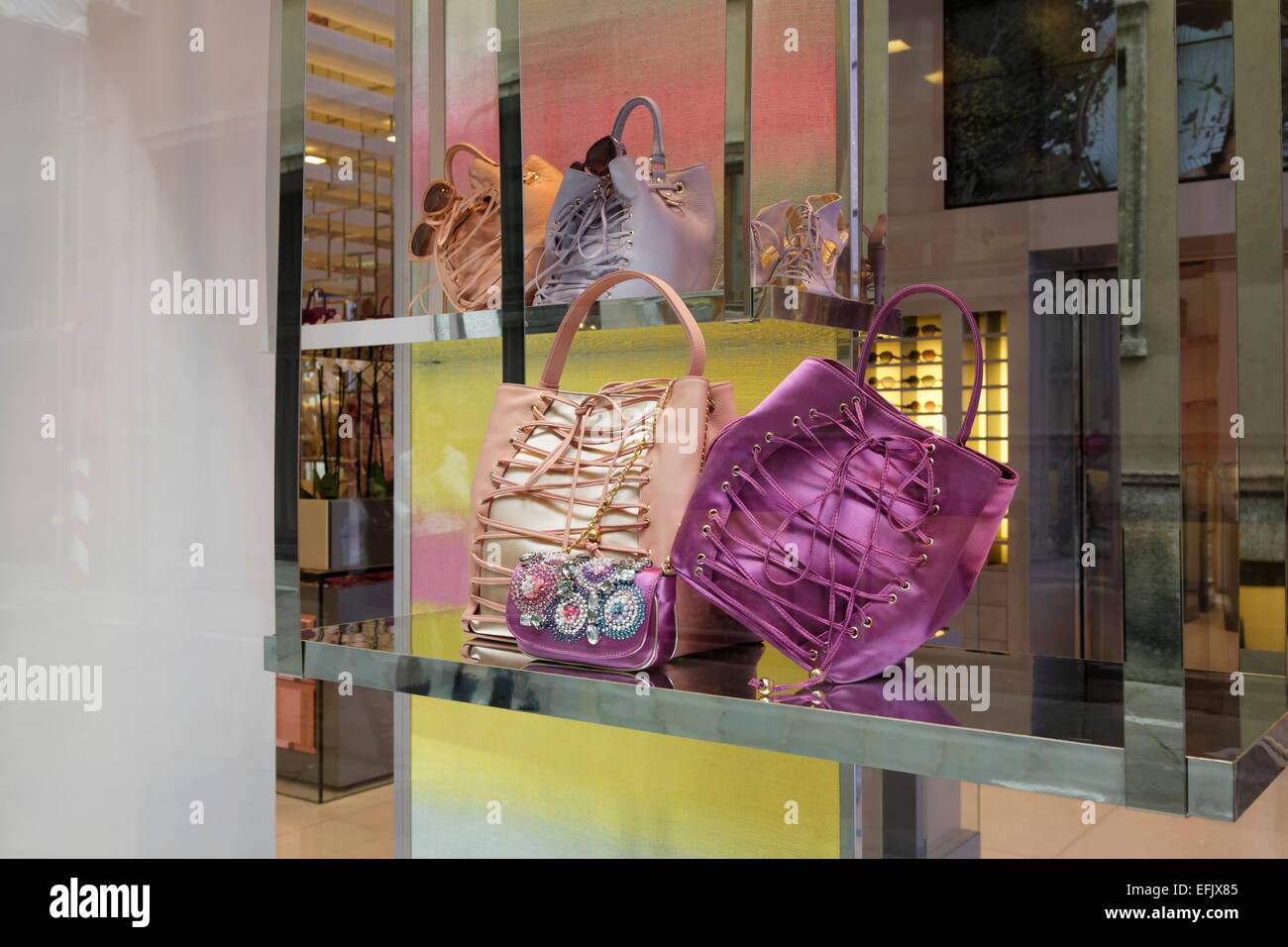 Handbags in a shopwindow, Via Montenapoleone, Golden Triangle, Milan, Lombardy, Italy Stock Photo