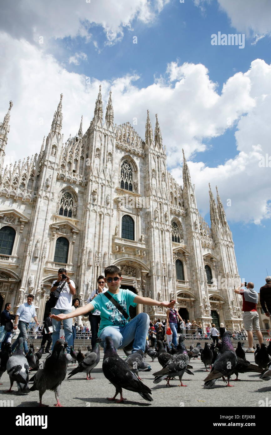 Doves at Piazza del Duomo with Milan Cathedral in the background, Milan, Lombardy, Italy Stock Photo