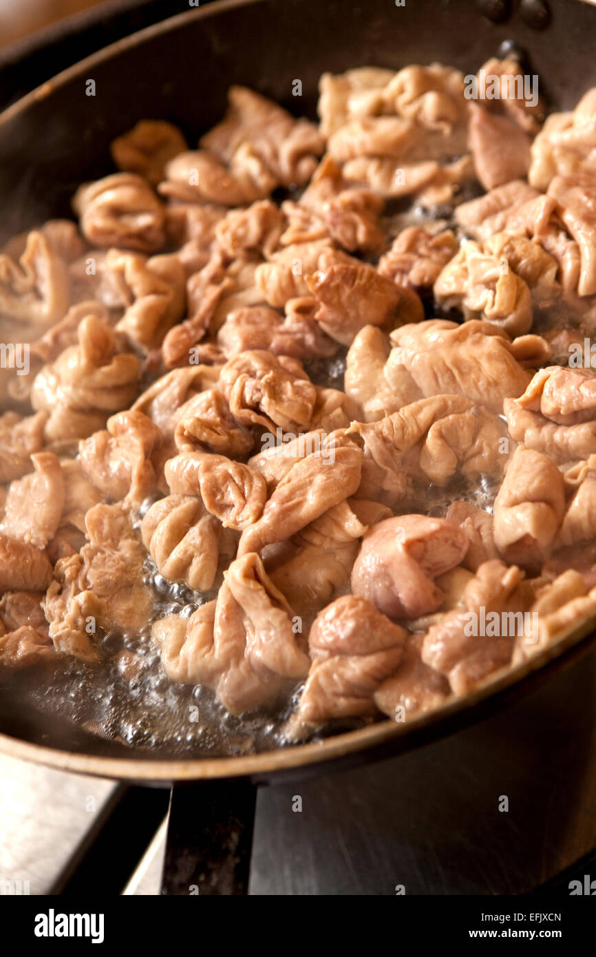 Frying Chitterlings in a pan Stock Photo Alamy