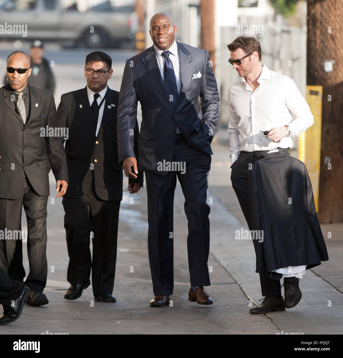 Hollywood, California, USA. 5th Feb, 2015. Former Lakers Basketball guard Magic Johnson, along with American actor, Scott Foley arrive at Jimmy Kimmel Live! in Hollywood, sneaking in and out on Thursday afternoon. Magic stopped momentarily to greet fans and sign autographs before going in for his appearance. Credit:  David Bro/ZUMA Wire/Alamy Live News Stock Photo