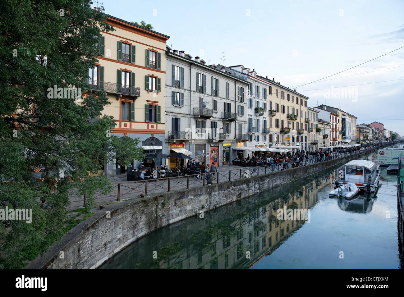 Restaurants and bars along a canal, Navigli quarter, Milan, Lombardy, Italy Stock Photo
