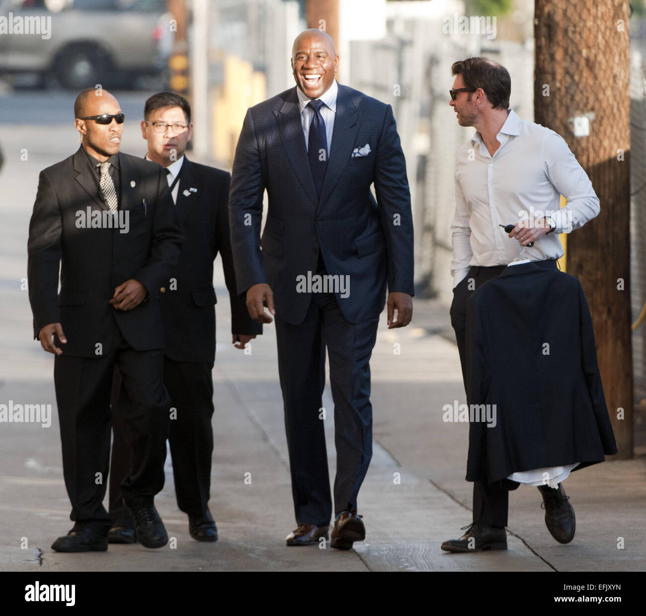 Hollywood, California, USA. 5th Feb, 2015. Former Lakers Basketball guard Magic Johnson, along with American actor, Scott Foley arrive at Jimmy Kimmel Live! in Hollywood, sneaking in and out on Thursday afternoon. Magic stopped momentarily to greet fans and sign autographs before going in for his appearance. Credit:  David Bro/ZUMA Wire/Alamy Live News Stock Photo