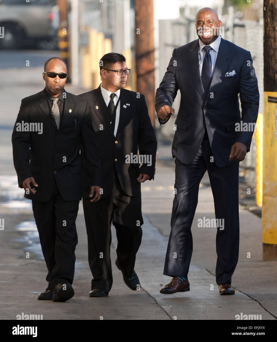 Hollywood, California, USA. 5th Feb, 2015. Former Lakers Basketball guard Magic Johnson, along with American actor, Scott Foley arrive at Jimmy Kimmel Live! in Hollywood, sneaking in and out on Thursday afternoon. Magic stopped momentarily to greet fans and sign autographs before going in for his appearance. Credit:  David Bro/ZUMA Wire/Alamy Live News Stock Photo