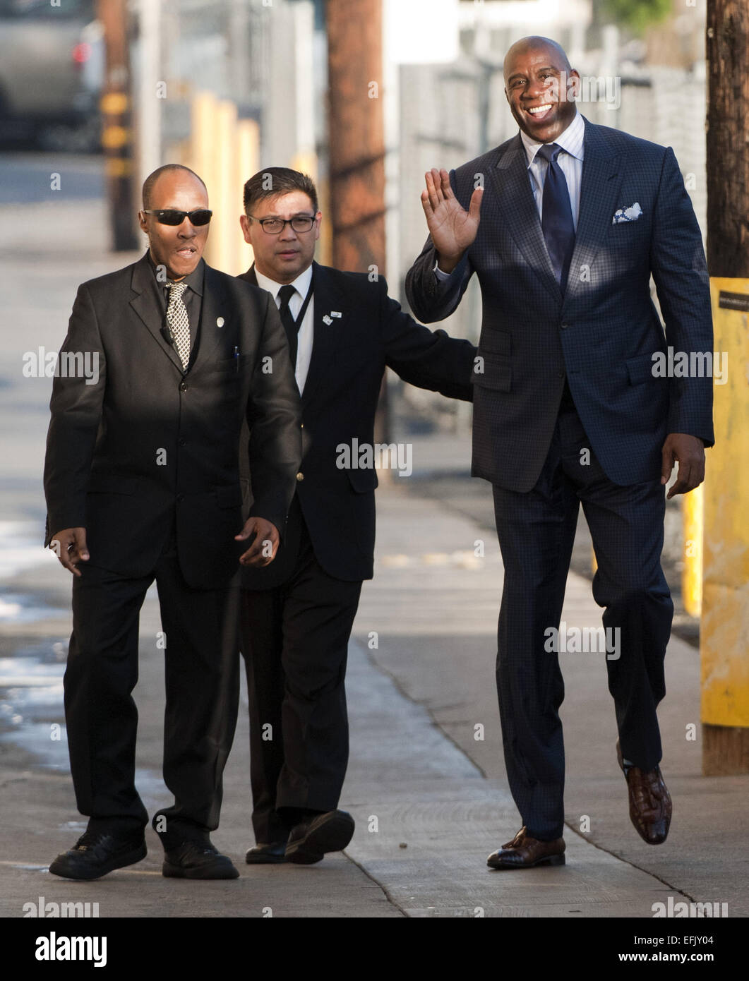 Hollywood, California, USA. 5th Feb, 2015. Former Lakers Basketball guard Magic Johnson, along with American actor, Scott Foley arrive at Jimmy Kimmel Live! in Hollywood, sneaking in and out on Thursday afternoon. Magic stopped momentarily to greet fans and sign autographs before going in for his appearance. Credit:  David Bro/ZUMA Wire/Alamy Live News Stock Photo