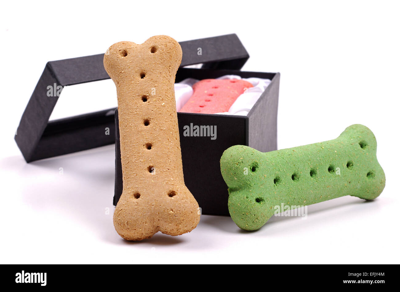 dog biscuits and a black box Stock Photo