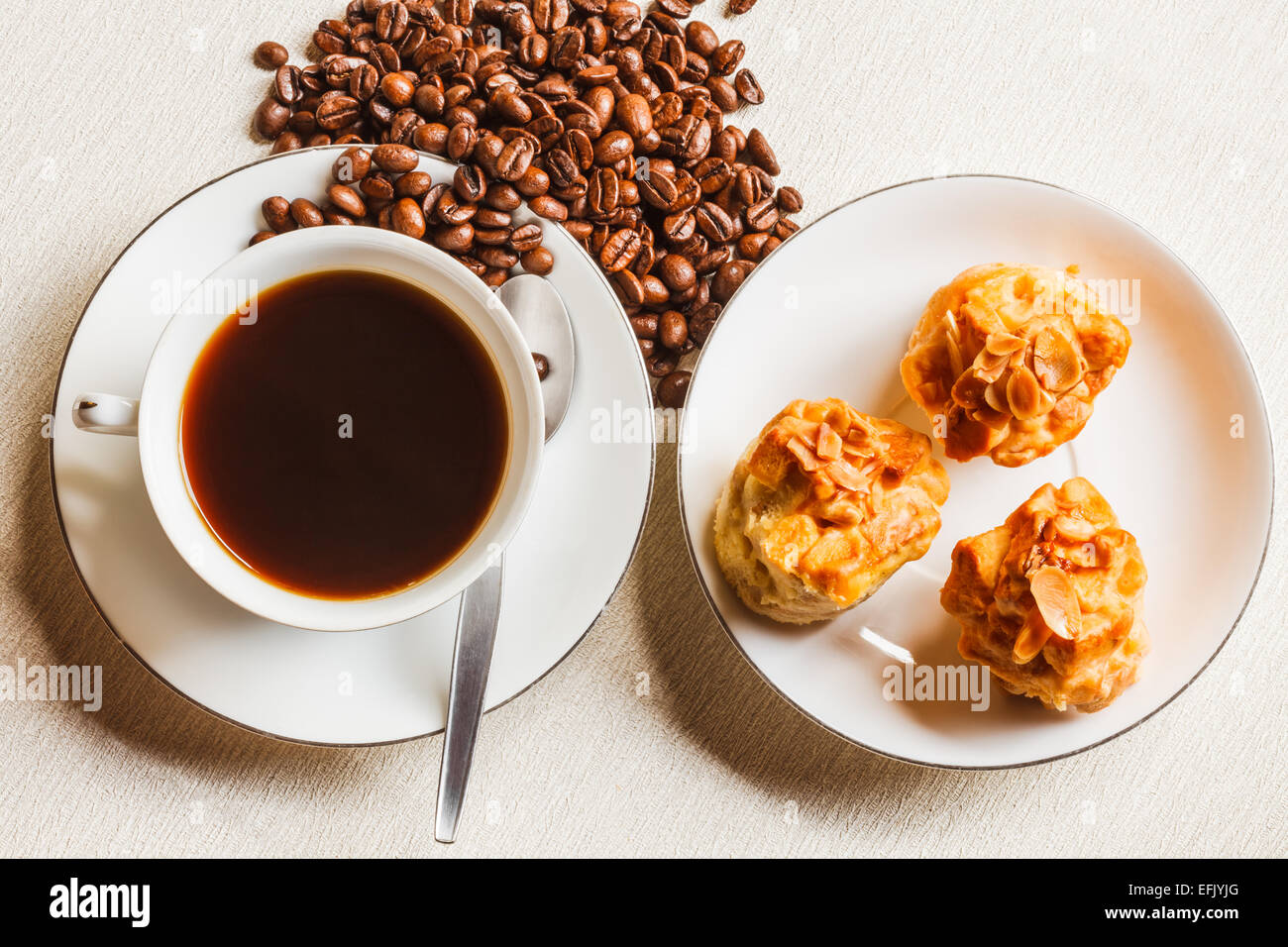Scone bread and a cup of coffee on white plate Stock Photo