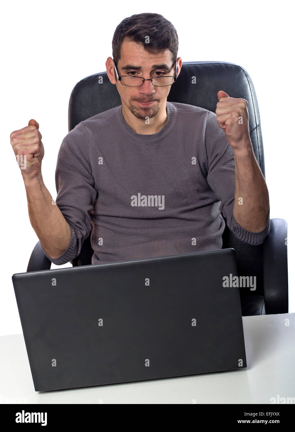 Angry man having problem with his laptop isolated over white background Stock Photo