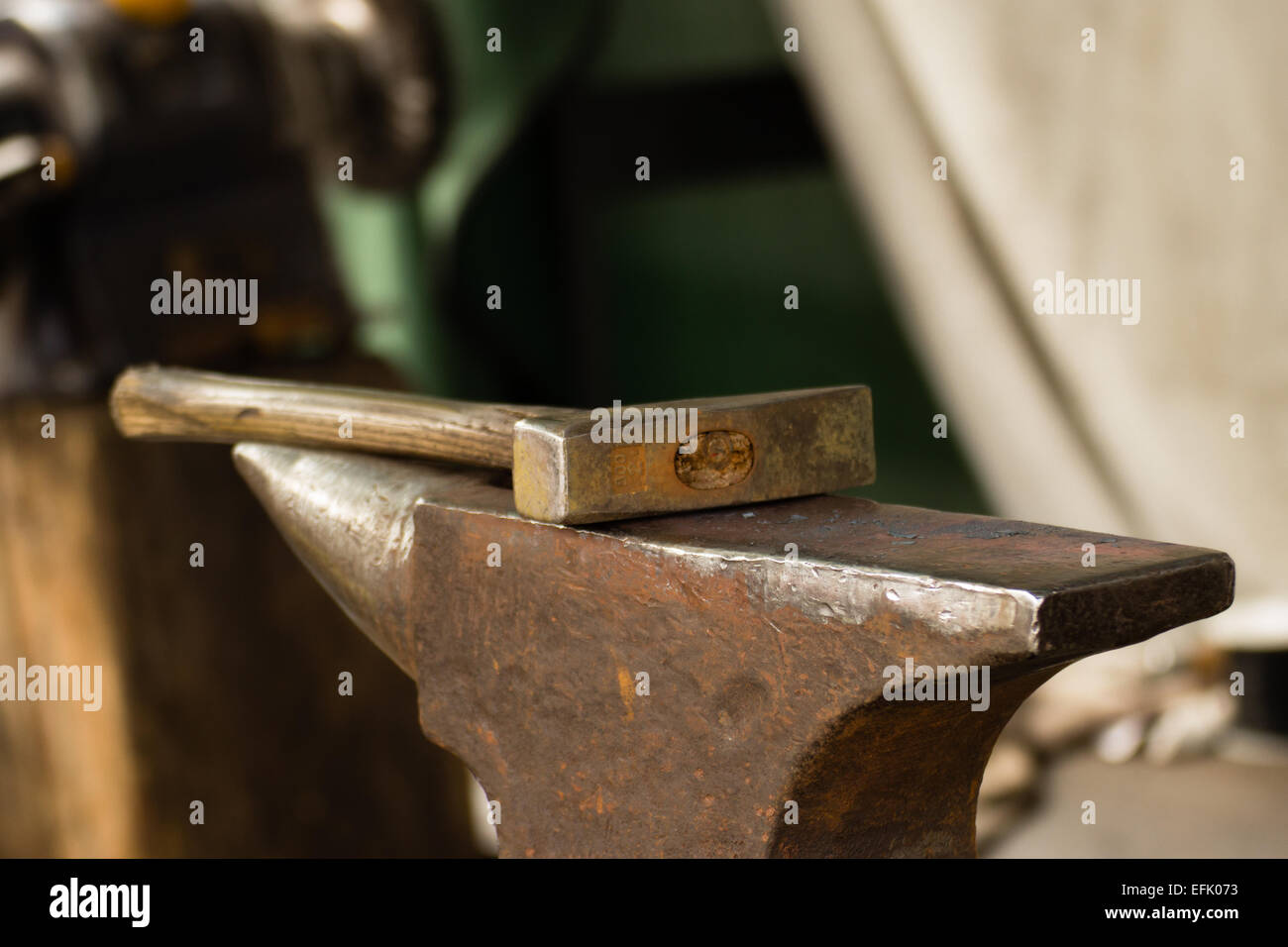 Hammer Is A Tool Of A Blacksmith On A Small Anvil Stock Photo